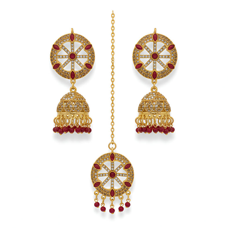 Gold and red gemstone earrings on a white background