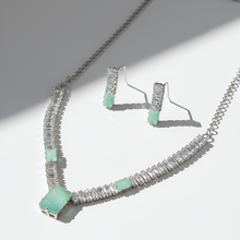 Jewelry set with necklace and earrings on a white background