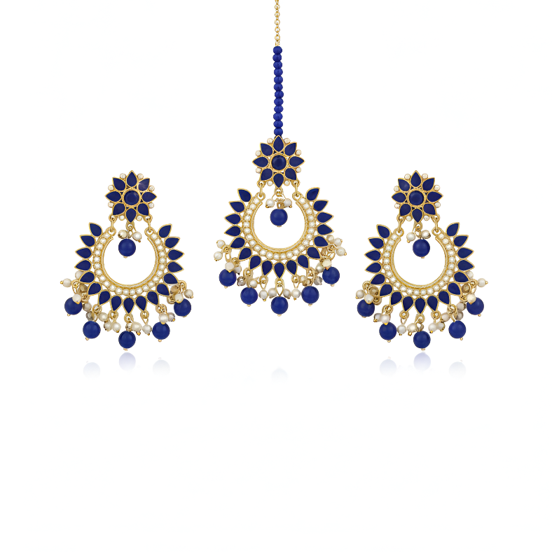Set of blue and gold earrings on a white background