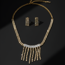 Jewelry set with necklace and earrings on a black background