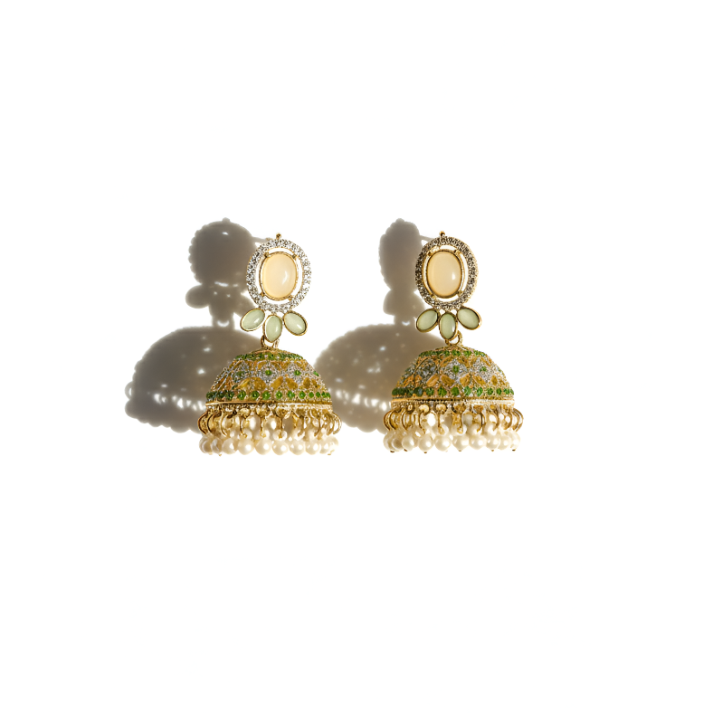 Gold and green earrings on a white background